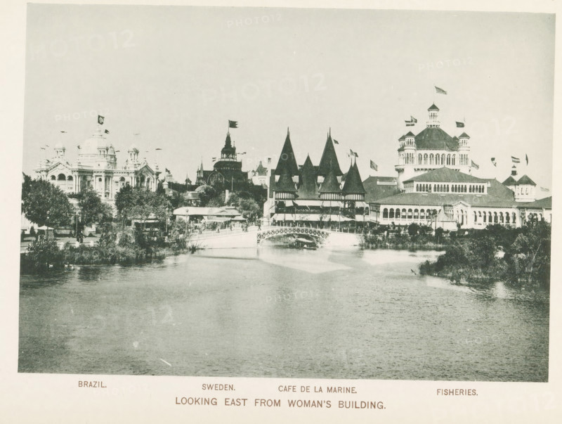 Looking east from Woman's Building, View of the World's Columbian Exposition in Chicago in 1893 with pavilions of Brazil and Sweden, the Cafe de la Marine and the fisheries building, page, photomechanical print, inscription: 'Brazil. Sweden. Cafe de la Marine. Fisheries.', number: 'Plate 46', photographer: Charles Dudley Arnold, Chicago, photographer: HD Higinbotham, clichémaker: anonymous, 1893, North America, Illinois, paper, collotype, photogravure, height 133 mm x width 190 mm, world fair, world exhibition, World's Columbian Exposition, A wide waterscape fills the foreground with gentle ripples leading to a shoreline lined with trees and low vegetation, and a decorative arched bridge crossing the water toward a cluster of ornate buildings; along the shore are multi-tiered structures with steep conical roofs and towers, a domed building with columns and smaller turrets, and a large pavilion-like building with rows of arched windows and a prominent cupola, many buildings displaying f...