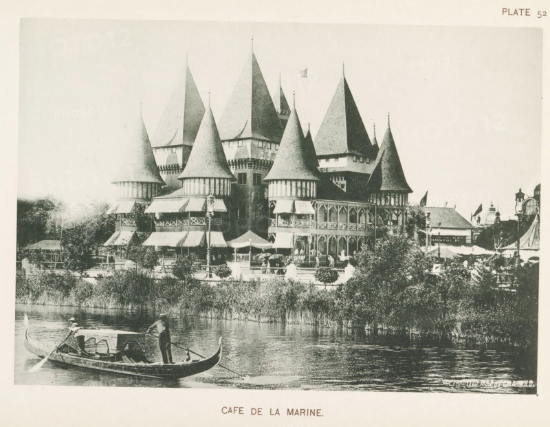 Cafe de la Marine, View of the Café de la Marine at the World's Columbian Exposition in Chicago in 1893, page, photomechanical print, number: 'Plate 52', photographer: Charles Dudley Arnold, Chicago, cliché maker: anonymous, 1893, Charles Dudley Arnold, photographer, cliché maker, North America, Illinois, paper, collotype, photoprint, height 134 mm x width 191 mm, inn, coffee-house, public house, world fair, world exhibition, World's Columbian Exposition, A riverside scene showing a large ornate building with multiple steep conical and pyramidal roofs, turrets, and decorative wooden balconies along its façade, with awnings over the lower-level openings and people visible on the balcony and near the entrance; trees and shrubs line the bank in front of the building; a gondola-like boat with a covered seating area is on the water in the foreground with a standing oarsman and another person seated under the cover; the water reflects the boat and vegetation; additional smaller structures an...
