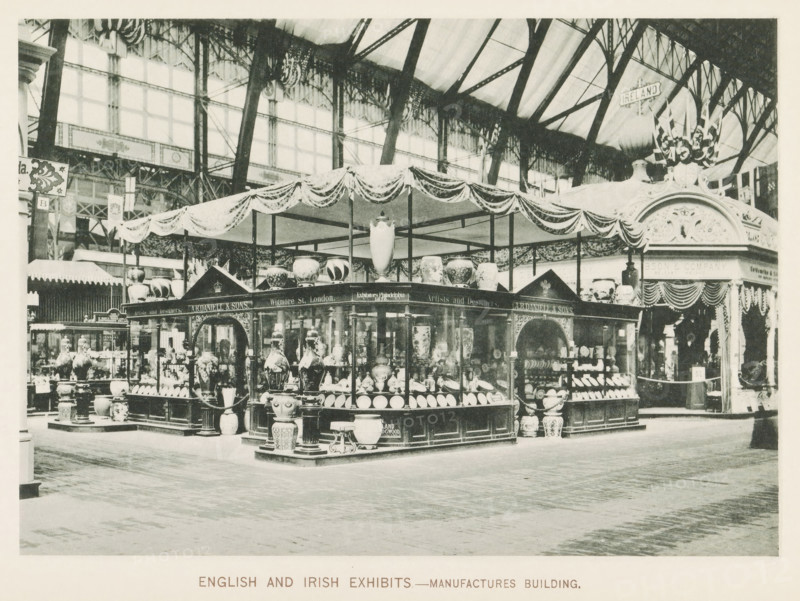 English and Irish exhibits.- Manufactures Building, Exhibition of England and Ireland in the Engineering Building during the World's Columbian Exposition in Chicago in 1893, page, photomechanical print, number: 'Plate 6', photographer: Charles Dudley Arnold, Chicago, photographer: HD Higinbotham, clichémaker: anonymous, 1893, Charles Dudley Arnold, HD Higinbotham, photographer, clichémaker, North America, Illinois, paper, collotype, photogravure, height 134 mm x width 190 mm, world fair, world exhibition, World's Columbian Exposition, A large indoor exhibition space with a central pavilion draped in decorative fabric and supported by slender posts, surrounded by display cases filled with ceramic vases, bowls, and ornamental vessels of various shapes and sizes, and several large decorative urns placed on pedestals around the perimeter; the space has a high arched glass and iron roof with visible beams and trusses, patterned windows along the upper walls, and ornate architectural details...