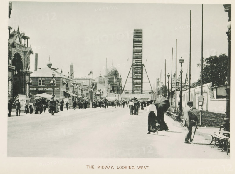 The Midway, looking west, View of a street with national pavilions and a Ferris wheel at the World's Columbian Exposition in Chicago in 1893, page, photomechanical print, number: 'Plate 97', photographer: Charles Dudley Arnold, Chicago, photographer: HD Higinbotham, clichémaker: anonymous, 1893, Charles Dudley Arnold, HD Higinbotham, photographer, clichémaker, North America, Illinois, paper, collotype, photogravure, height 132 mm x width 190 mm, world fair, world exhibition, giant wheel, Ferris wheel, World's Columbian Exposition, A wide promenade filled with people walking and standing beneath a bright sky, with many individuals wearing long coats and hats and some holding umbrellas; on the left a series of ornate buildings and pavilions with decorative facades and domes rise along the street, and on the right a tall Ferris wheel structure is visible behind a row of tall slender poles and lamp posts, with benches and a man leaning on a cane near the foreground edge.