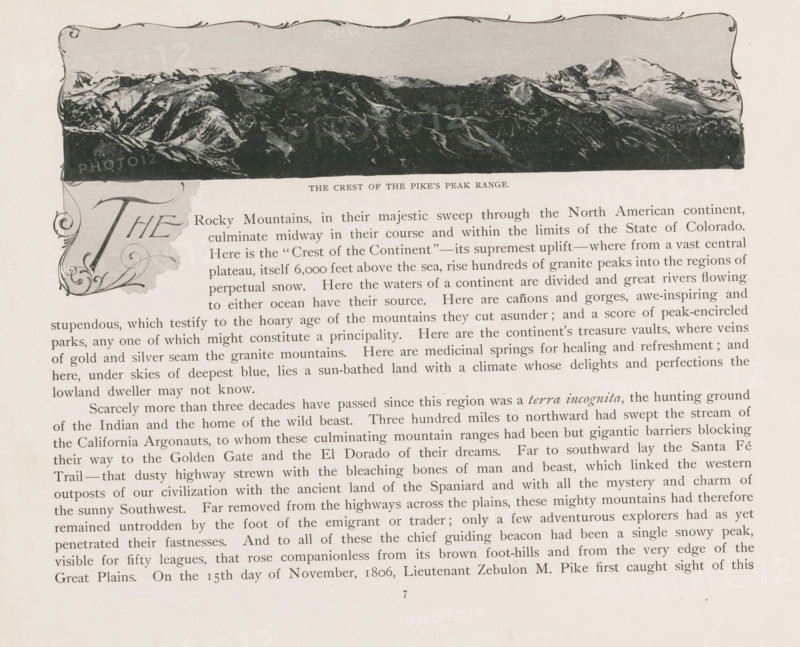 View of the Pikes Peak mountain range, The crest of the Pike's Peak range, page, photomechanical print, Colorado, cliché maker: New York Photo-Gravure Company, New York (city), c. 1888 - in or before 1893, New York Photo-Gravure Company, photographer, cliché maker, North America, paper, autotypie, height 79 mm x width 198 mm, landscapes, mountain-range, snow peaks, El Paso (Colorado), Pikes Peak (El Paso), A printed page showing a decorative rectangular illustration of a mountain ridge across the top with a scalloped ornate border, below which is a block of serif text in columns spanning the page; at the left edge a large decorative initial occupies the margin with swirling flourishes, and the text area fills the remainder of the page with evenly spaced lines and a uniform margin around the edges.