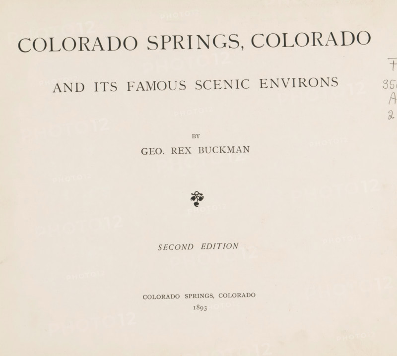 Colorado Springs, Colorado and its famous scenic environs, book, annotation: '$150- #5974', date: 'Jan 2000', writer (clerical worker): George Rex Buckman, 1893, writer (clerical worker), textile materials, paper, linen (material), transparent paper, printing, photoaquatint, autotype, height 235 mm x width 288 mm x thickness 14 mm, A pale cream page with large dark serif lettering arranged in centered horizontal lines near the top and middle, a small decorative black flourish below the middle, faint pencil marks along the right edge, and an overall worn paper texture with subtle spots and creases.