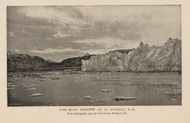 The Muir glacier at 10 o'clock, PM, View of the Muir Glacier, page, photomechanical print, inscription: 'From photograph 7596, by Partridge, Portland, Ore.', inscription: 'Photo-Eng Co. NY', photographer: William Henry Partridge, Skagway-Hoonah-Angoon, cliché maker: Photo-Engraving Co., New York (city), c. 1885 - in or before 1890, William Henry Partridge, Photo-Engraving Co., photographer, cliché maker, North America, Alaska, paper, autotypie, height 95 mm x width 165 mm, Print opposite table of contents., glacier, Muir Glacier, A wide seascape with a textured sky above a distant mountain range and a tall jagged ice cliff rising from the water, the foreground showing a calm surface dotted with irregular floating ice pieces and small icebergs, all rendered in a grainy monochrome tone.