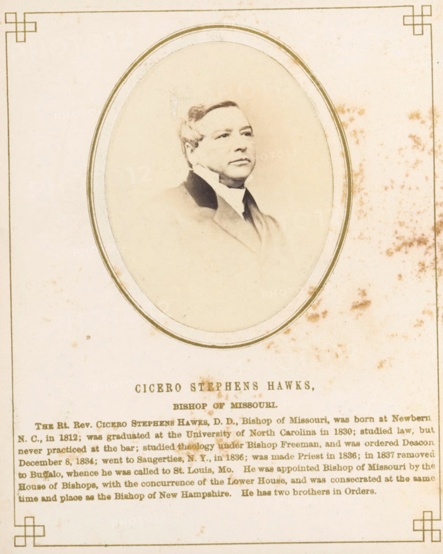 Portrait of Cicero Stephens Hawks, photograph, page, inscription: 'Cicero Stephens Hawks, Bishop of Misouri, ', photographer: J. Gurney & Son, in or after 1861-10-16 - in or before 1861-10-20, Jeremiah Gurney & Son, paper, albumen print, height 70 mm x width 53 mm, Person, Cicero Stephens Hawks, historical persons, An oval sepia portrait of a man in formal attire is centered on a faded cream page with a thin decorative border; the man has short hair, a high collar, and a dark coat, and the portrait area shows age spots and staining that also appear on the surrounding paper, with additional decorative corner motifs and a block of printed lines beneath the oval.