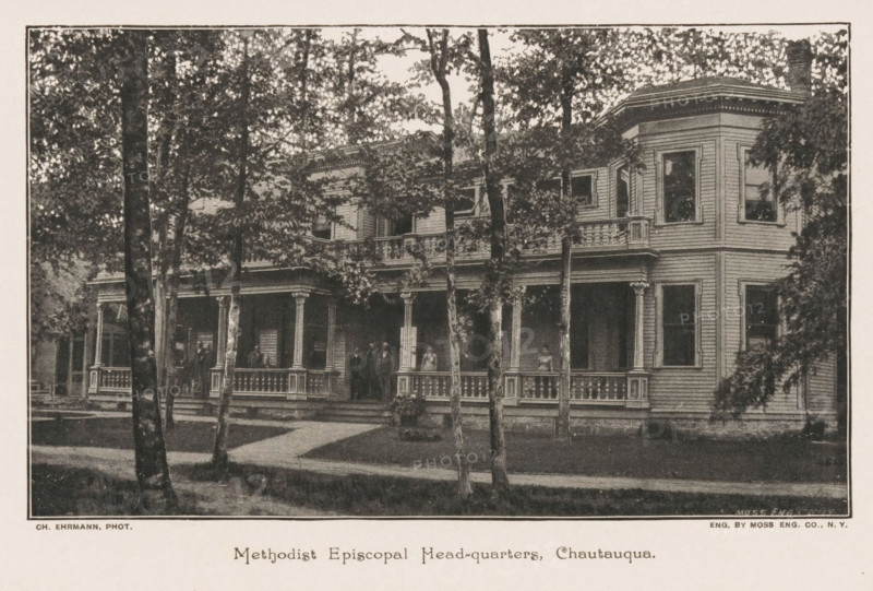 Methodist Episcopal Head-quarters, Chautauqau, View of the headquarters of the Methodist Episcopal Church in Chautauqau, New York, page, photomechanical print, photographer: Ch. Ehrmann, cliché maker: Moss Engraving Co. (possibly), c. 1884 - in or before 1889, printer (person), North America, paper, autotype, height 95 mm x width 159 mm, Print on third unnumbered page after page 328., organizations, assemblies, etc., episcopal Protestant churches, A large two-story wooden building with a wide covered porch extending across the front and decorative railings and columns, a corner bay with several windows, multiple tall trees in front partially obscuring the facade, shaded areas beneath the porch and around the trees, a lawn and a paved walkway leading to the porch steps, and a few people standing on the porch.