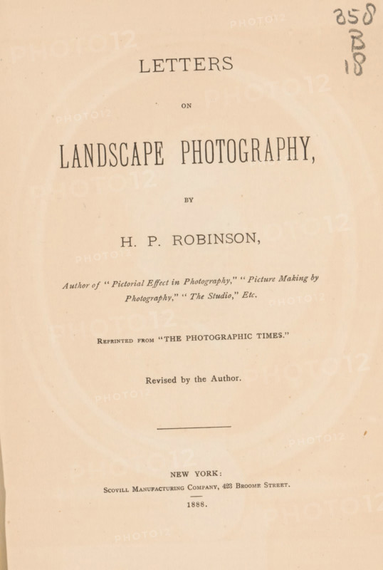 Letters on landscape photography, book, writer (clerical worker): Henry Peach Robinson, publisher: Scovill and Adams, New York (city), 1888, writer (clerical worker), North America, pasteboard, paper, textile materials, printing, photoaquatint, height 236 mm x width 155 mm x thickness 19 mm, A vertically oriented aged book page with a cream background and visible paper texture, showing a centered layout of printed lines and short passages in various serif typefaces, with a narrow horizontal rule near the middle and a small handwritten notation in pencil near the upper right edge, plus faint circular discoloration rings and small scattered spots across the surface.