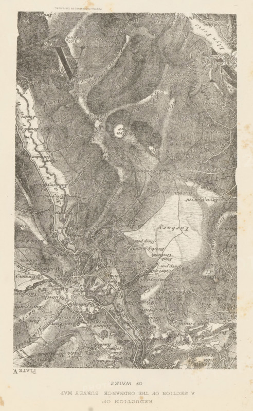 Reduction of a section of the ordnance survey map of Wales, Section of a map of Wales, page, photomechanical print, inscription: 'Plate V', cliché maker: S. Parkins, c. 1870 - in or before 1875, photographer, paper, lithography, height 150 mm x width 93 mm, maps, atlases, A vertically oriented detailed monochrome map with dense contour shading indicating hilly terrain, winding rivers and streams, a large irregular lake area, clustered road lines and small built-up areas, scattered isolated circular features, various curving paths and boundary lines, textured hill slopes and valleys, and small patches of lighter open ground against a pale background.