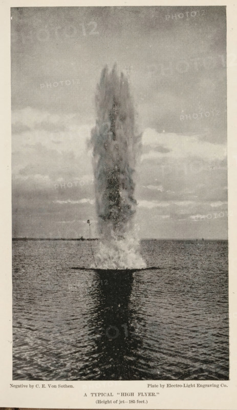 A typical 'high flyer', page, photomechanical print, photographer: CE von Sothen, cliché maker: Electro-Light Engraving Co., c. 1888 - in or before 1893, paper, autotypie, height 187 mm x width 108 mm, water course, projectiles, explosives, A tall, vertical column of water shooting upward from the surface of a body of water, with a dense plume at the base and a narrowing, misty top, reflected as a dark vertical shape on the rippling water below; the horizon line with a distant shoreline and small structures appears in the background beneath a sky filled with layered clouds.
