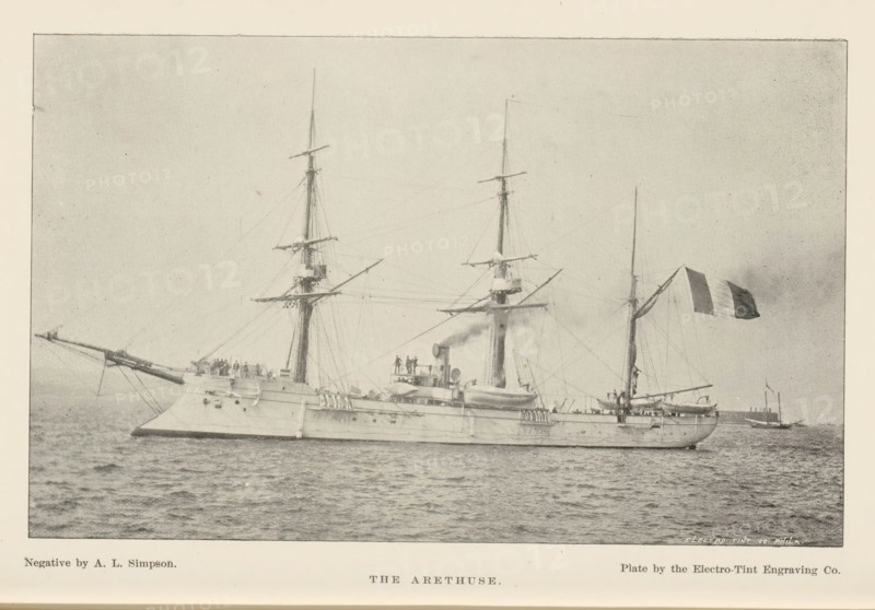 The Arethuse, page, photomechanical print, photographer: AL Simpson, cliché maker: Electro-Tint Engraving Co., c. 1888 - in or before 1893, paper, autotype, height 102 mm x width 163 mm, ships (in general), A large naval ship is shown afloat on calm water, photographed from its side; the vessel has a long hull with gun ports and a raised forecastle, two tall masts with spars and rigging, and a shorter mast toward the stern. Several figures stand on the deck and near a central superstructure with funnels and equipment. A long bowsprit projects forward over the water. A flag with vertical dark and light panels flies from a mast near the stern. The sky is pale and uniform, and another smaller vessel appears in the distant background on the right.