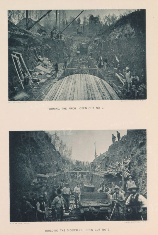 Building the sidewalls open cut no 9, Pocantico gate house. Looking east, page, photomechanical print, photographer: P. de Luze, New York, cliché maker: The Photo-gravure Co., c. 1883 - in or before 1887, North America, paper, collotype, photoprint, height 345 mm x width 272 mm, building-site, working class, laborers, A vertical page with two large black-and-white photographs showing a deep excavation flanked by steep earthen walls and scattered construction materials, the top photograph centered on a curved wooden structure spanning the trench with workers standing along narrow ledges and tools and barrels piled to one side, trees and a small wooden building visible at the far end and cranes or derricks rising above the site, the lower photograph showing many workers clustered in and around the trench with wooden beams and formwork, men holding shovels and other implements, piles of lumber and equipment on the slopes, and groups of figures standing on the rim of the cut overlooking th...