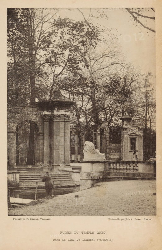 Ruins of a Greek temple in Lazienki Park, Ruines du temple grec - dans le parc de lazienki (varsovie), page, photomechanical print, maker: F. Bardet, maker: Jules Royer, c. 1889 - in or before 1894, paper, collotype, photoprint, height 169 mm x width 121 mm, ruin of a building, architecture, A sepia-toned photograph of classical stone ruins set among tall trees, showing columns, archways, and balustrades; a draped reclining sculpture rests on a raised pedestal near a stairway; a person stands at the base of the stairs facing the ruins, holding a walking stick; leafless and leafy branches form a backdrop above the architectural elements; worn stone steps and pathways lead through the scene, and a section of water with a small dock is visible in the foreground.