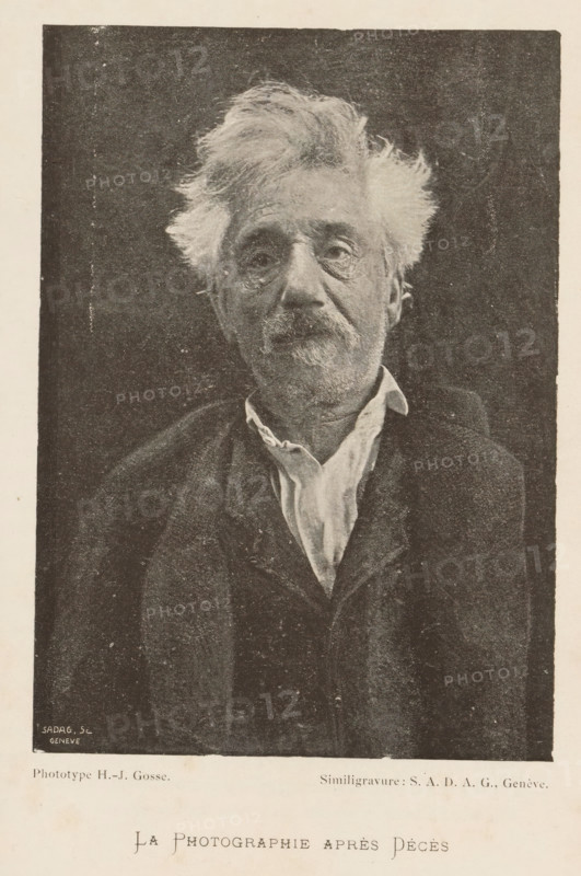 Portrait of an unknown deceased man, La Photographie après Décès, page, photomechanical print, maker: H.-J. Gosse, cliché maker: Société Anonyme des Arts Graphiques, Geneva, c. 1892 - in or before 1897, paper, autotypie, height 140 mm x width 100 mm, historical persons not known by name, the corpse, A sepia-toned portrait of an older man shown from the chest up, with tousled white hair and a mustache and beard, wearing a dark coat and a lighter collar visible at the neck, set against a dark textured background, the image framed by a lighter margin.