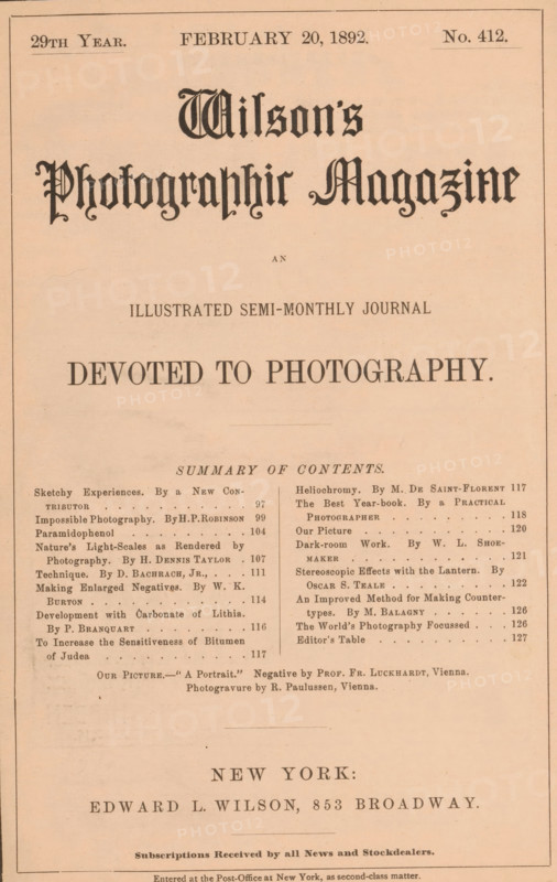 Wilson's photographic magazine, magazine, publisher: Edward Livingston Wilson, New York (city), 1892-02-20, Edward Livingston Wilson, publisher, North America, paper, printing, autotype, wood engraving, printing block, photoaquatint, height 258 mm x width 175 mm x thickness 4mm, A sepia-toned page with ornate blackletter title text centered near the top, a smaller line of uppercase text beneath it, a bold uppercase slogan in large serif type in the middle, and a two-column list of article headings and short lines of text below a small uppercase section heading, all enclosed by a thin rectangular border, with a centered line of larger uppercase text and a line of smaller uppercase text toward the lower portion of the page.