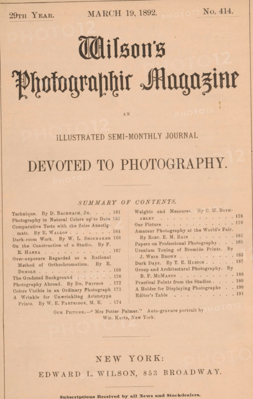 Wilson's photographic magazine, magazine, publisher: Edward Livingston Wilson, New York (city), 1892-03-19, Edward Livingston Wilson, publisher, North America, paper, printing, wood engraving, autotype, height 252 mm x width 177 mm x thickness 4 mm, A vertical page with a pale peach background and dark printed headings arranged in centered and column formats, featuring ornate blackletter title lettering near the top and a large bold line of capitalized serif text below, followed by a thin horizontal rule and a block of smaller serif text laid out in two narrow columns with dotted leader lines, and a wide blank margin near the bottom above another centered line of bold serif text and additional smaller centered lines near the base.