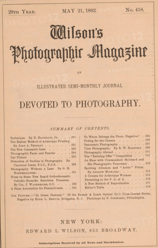 Wilson's photographic magazine, magazine, publisher: Edward Livingston Wilson, New York (city), 1892-05-21, Edward Livingston Wilson, publisher, North America, paper, printing, wood engraving, autotype, collotype, height 255 mm x width 176 mm x thickness 4 mm, A tall, narrow printed page with a pale, slightly aged background and a thin rectangular border, featuring a large ornate headline in a dark decorative blackletter style centered near the top, followed by smaller lines of centered text in various serif fonts, a wide blank area, a centered bold phrase in uppercase serif type, a horizontal rule and then a two-column list of entries in small serif type separated by a thin vertical dividing line, with some short paragraphs and additional small text blocks toward the bottom, and a larger centered line of bold serif text near the lower portion above a final small line of fine print at the very bottom.