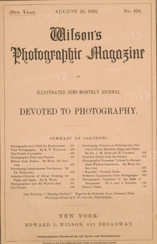 Wilson's photographic magazine, magazine, publisher: Edward Livingston Wilson, New York (city), 1892-08-20, Edward Livingston Wilson, publisher, North America, paper, printing, wood engraving, autotype, collotype, height 257 mm x width 174 mm x thickness 4 mm, The image shows a sepia-toned magazine cover with ornate blackletter masthead across the top and several lines of centered headings and subheadings below, separated by thin horizontal rules; there is a two-column list of entries in smaller type in the middle portion, framed by a thin rectangular border around the whole page, and larger centered publisher information and location near the lower portion.