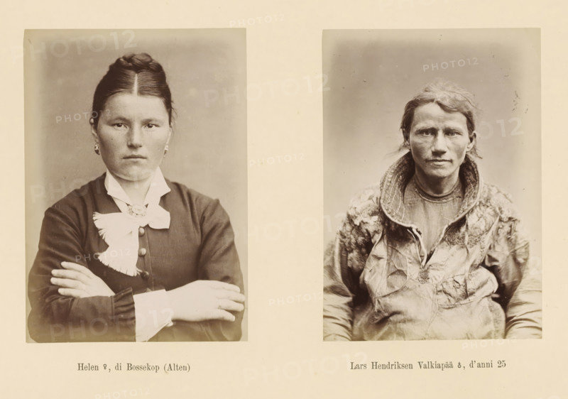 Helen ?, di Bossekop (Alten), Two portraits of Helen and Lars Hendriksen Valkiapää, Lars Hendriksen Valkiapää ?, d' anni 25, page, Left a front view of Helen, right a front view of Lars Hendriksen Valkiapää., number: 'Tavola XX.', photographer: Paolo Mantegazza, Scandinavia, photographer: Carlo Pietro Stefano Sommier, c. 1870 - in or before 1880, Paolo Mantegazza, Carlo Pietro Stefano Sommier, paper, albumen print, height 254 mm x width 340 mm, Photo in photo section at the back., adult man (front view), adult woman (front view), Two sepia-toned photographic portraits printed side by side on cream paper show a woman on the left and a man on the right. The woman faces forward with arms crossed, dark hair parted in the middle and styled back, wearing earrings and a dark dress with a high white collar and a large white bow at the throat; her expression is neutral. The man also faces forward with a direct gaze, tousled lighter hair, weathered facial features, and stubble, wearing a texture...