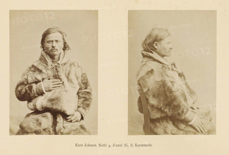 Knut Johnsen Nutti ?, d' anni 25, di Karasuando, Two portraits of Knut Johnsen Nutti, page, Left a front view, right a side view., number: 'Tavola III.', photographer: Paolo Mantegazza, Scandinavia, photographer: Carlo Pietro Stefano Sommier, c. 1870 - in or before 1880, Paolo Mantegazza, Carlo Pietro Stefano Sommier, paper, albumen print, height 254 mm x width 340 mm, Photo in photo section at the back., fashion, clothing (fur used for clothes), adult man (side view, profile), adult man (front view), A sepia-toned photographic print shows two portrait images of a man placed side by side on a pale background; on the left he faces forward with a neutral expression, shoulder-length hair, a mustache, and a fur garment covering his torso while one hand rests on his chest and the other rests lower on his lap with a fur cap visible; on the right he is shown in profile facing right seated on a wooden chair, wearing the same fur garment with his hands resting in his lap and his hair falling to...