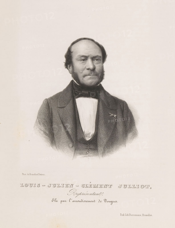 Reproduction of a photograph of a portrait of Louis Julliot, Louis-Julien-Clément Julliot, print, reproduction, page, inscription: 'Représentant, Elu par l'arrondissement de Tongres.', printmaker: Henri Borremans, Brussels, after photo by Brand & Detrez, c. 1853 - in or before 1858, Henri Borremans, Brand & Detrez, printmaker, paper, lithography, lithografie, height 191 mm x width 146 mm, Person, Louis Julliot, historical persons, A black and white lithographic portrait of a middle-aged man shown from the chest upward wearing a dark suit jacket, a waistcoat, a high-collared shirt, and a bow tie, with short dark hair, prominent sideburns, and a neutral facial expression, set against a plain light background with printed text visible below the portrait.