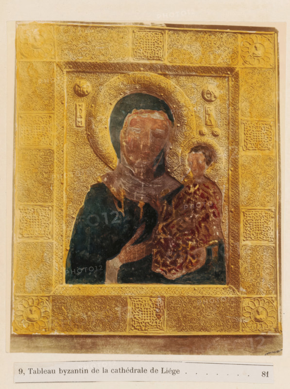 Relief of Mary with child in St. Paul's Cathedral in Liège, Tableau byzantin de la cathédrale de Liége, photograph, page, c. 1877 - in or before 1882, photographer, paper, albumen print, hand coloring, hand colored in blue, red and yellow, height 142 mm x width 119 mm, Madonna: ie Mary with the Christ-child, sculpture (relief, sculpture), A rectangular framed image with a gold patterned border showing two figures; a larger central figure wearing a dark garment and a circular halo around the head holds a smaller figure clad in a richly patterned robe, both faces rendered in worn, muted tones; the border contains repeated circular decorative motifs and square panels with intricate knot-like designs, and corner rosette elements, all in golden hues against a pale background.