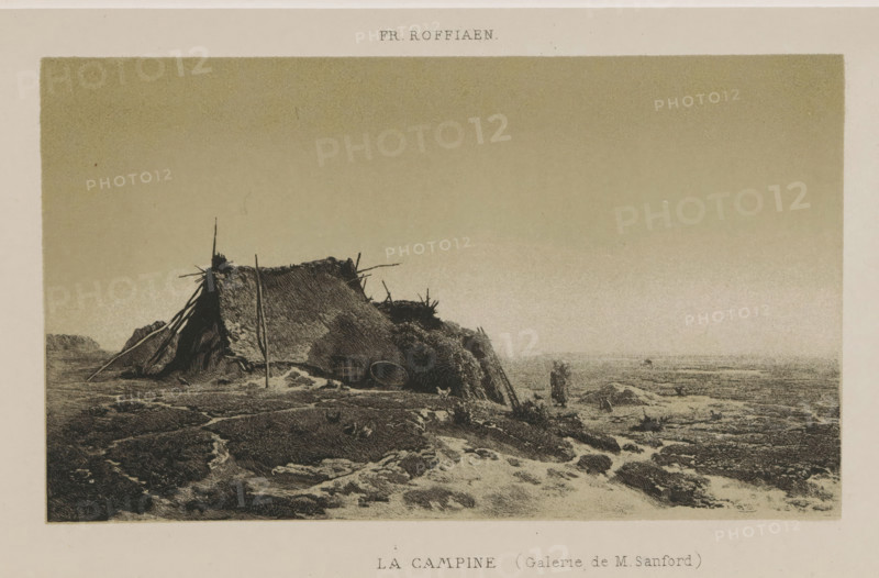 Reproduction of De Kempen by Jean François Xavier Roffiaen, La Campine, reproduction, page, photomechanical print, inscription: 'Galerie de M. Sanford', cliché maker: Asser & Toovey, after design by Jean François Xavier Roffiaen, printer (person): Simonau & Toovey, c. 1862 - in or before 1867, photographer, printer (person), paper, photolithography, height 92 mm x width 165 mm, Print two pages before page 102., landscapes, hut, cabin, lodge, A monochrome scene showing a low, thatched shelter made of woven material and supported by wooden poles, situated on a rocky shoreline with rough ground texture in the foreground and a flat sea stretching to the horizon; near the shelter there are baskets and scattered debris, a lone standing figure is visible close to the water, and the sky above is a smooth gradient without clouds.