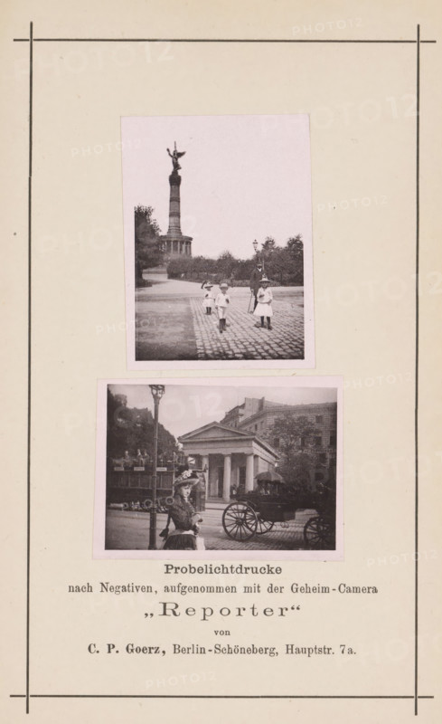 Two street views in Berlin, one with the Victory Column, page, photomechanical print, inscription: 'Probelichtdrucke, nach Negativer, aufgenommen mit der Geheim-Camera 'Reporter' von CP Goerz, Berlin-Schöneberg, Hauptstr. 7a., Beilage zu Eder's Jahrbuch für Photographie 1890.', maker: anonymous, c. 1885 - in or before 1890, paper, collotype, photoprint, height 105 mm x width 60 mm, Print on fifteenth unnumbered page after page 400., street (city(-scape) with figures, staffage), monument, statue (city(-scape) with figures, Berlin, Victory Column, A tall rectangular sheet with a thin dark border contains two pasted rectangular photographs centered vertically, the upper photograph showing a cobblestone path leading toward a tall column topped by a winged statue with trees and lampposts nearby and three children and an adult standing on the path, the lower photograph depicting a street scene with a woman in period dress and hat standing near a lamppost, a horse-drawn carriage with a covere...