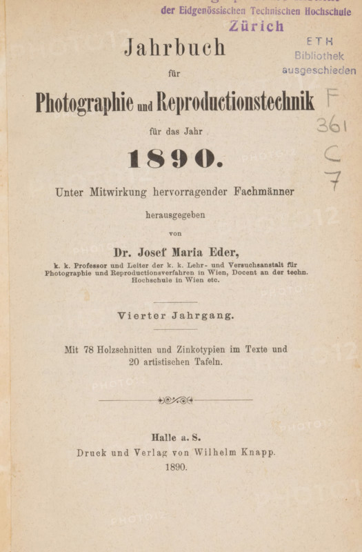 Jahrbuch für Photographie und Reproduktionstechnik, book, collector's mark: 'ETH, Bibliothek, augeschieden', date: 'MAR 1994', collector's mark: 'Photographic Institut, der Eidgenössischen Technischen Hochschule, Zürich', annotation: '26469, ...', publisher: Wilhelm Knapp, Halle an der Saale, compiler (person in literature): Josef Maria Eder, 1890, compiler (person in literature), Saxony-Anhalt, textile materials, paper, linen (material), printing, autotype, collotype, four-color autotype, photolithography, zincography, height 193 mm x width 136 mm x thickness 33 mm, A faded book page with printed headings and paragraphs in various typefaces, showing a large bold title near the top, smaller lines of centered text beneath it, and a prominent bold numeric line below those; stamped purple and blue marks appear near the top edge, and pencil scribbles are visible in the right margin; the paper has a beige tone with small speckles and slight discoloration spots, and a decorative horizontal o...