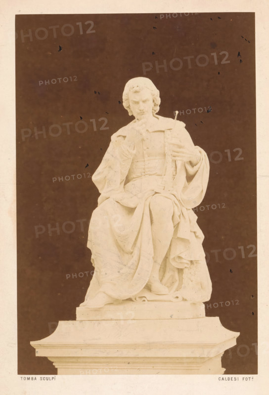 Statue of Evangelista Torricelli, photograph, page, photographer: Caldesi & Co, Italy, c. 1854 - in or before 1864, paper, albumen print, height 185 mm x width 123 mm, Photo opposite title page., Person, Evangelista Torricelli, monument, statue, A pale marble statue of a seated robed figure is shown against a dark rectangular background with a lighter border; the figure has wavy hair and a contemplative facial expression, one hand raised to the chin and the other holding a long slender object, while draped garments with folds cover the torso and legs and fall over the pedestal beneath.