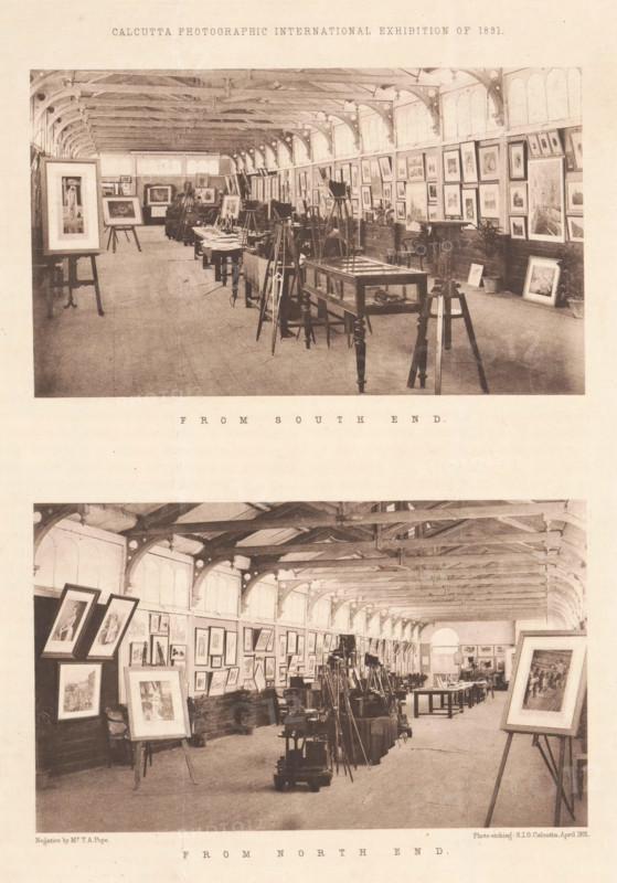 Calcutta photographic international exhibition of 1891, Two interiors of a photographic exhibition in Calcutta in 1891, page, photomechanical print, inscription: 'From south end. From north end.', photographer: TA Pope, Kolkata, maker: SIO Calcutta, 1891, Bengal, Northeast India, West Bengal, paper, photoaquatint, height 299 mm x width 219 mm, Prints after page 76., exhibition, art, A sepia-toned photograph of a long gallery interior with a high, vaulted ceiling supported by visible beams and arched windowed walls, filled with easels, framed pictures leaning and hanging along the walls, display cabinets and tables set along the central floor, various tripods and stands clustered in rows, potted plants near the walls, and framed artworks prominently shown on easels in the foreground.