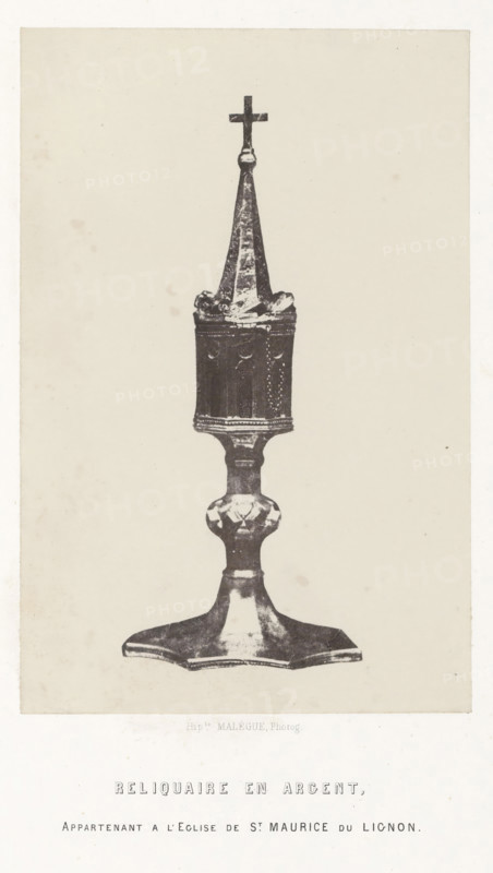 Reliquaire en argent, Silver reliquary from the Saint-Maurice church in Saint-Maurice-de-Lignon, photograph, page, number: 'PL. 10.', inscription: 'appartenant a l'eglise de St. Maurice du Lignon.', photographer: Hippolyte Malègue, France, c. 1850 - in or before 1857, Hippolyte Malègue, photographer, paper, salted paper print, height 208 mm x width 136 mm, relics (and reliquaries), A tall ornamental object with a cross at its top stands on a flared base; the object has a tapered spire above a cylindrical midsection with decorative detailing, a rounded central knop, and a wide, flat foot with a scalloped outline, shown against a plain light background.