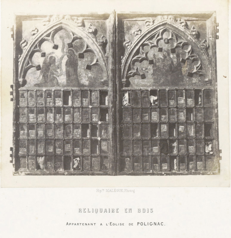 Wooden reliquary from a church in Polignac, Reliquaire en bois, photograph, page, number: 'PL. 26.', inscription: 'appartenant a l'Eglise de Polignac.', photographer: Hippolyte Malègue, France, c. 1850 - in or before 1857, Hippolyte Malègue, photographer, paper, salted paper print, height 158 mm x width 194 mm, relics (and reliquaries), A rectangular wooden panel with two hinged doors, each door topped by a gothic arched panel featuring carved floral tracery and faded painted figures, sits above a grid of small square compartments framed by rope-like moldings, some compartments holding worn paper fragments, while the wood shows aged patina and areas of darker wear; the panel rests on a light background with a wide margin beneath.