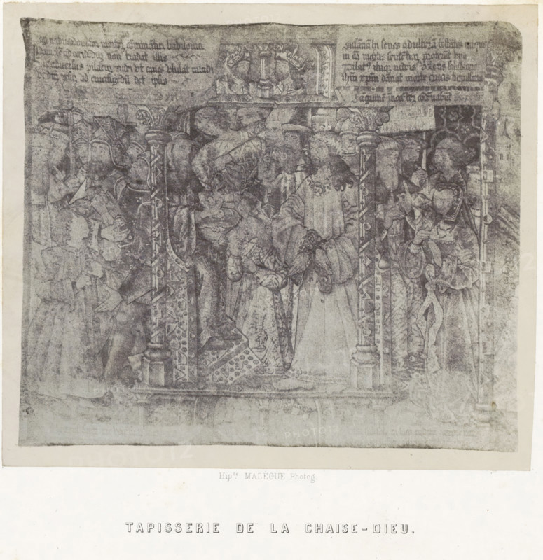 Tapestry from La Chaise-Dieu, Tapisserie de La Chaise-Dieu, photograph, page, number: 'PL. 29.', photographer: Hippolyte Malègue, France, c. 1850 - in or before 1857, paper, salted paper print, height 167 mm x width 192 mm, tapestry, A faded rectangular tapestry image with ornate vertical columns and decorative patterns framing a crowded scene of robed figures, some wearing crowns and headpieces, arranged under an arch; the figures include adults and children in medieval-style clothing, some holding staffs or objects, with layered drapery and patterned textiles; the upper portion shows a narrow band of decorative text and a small central panel with two crowned figures flanking a central vertical element; the overall image appears worn and unevenly toned with lighter margins and a pale border surrounding the illustration.