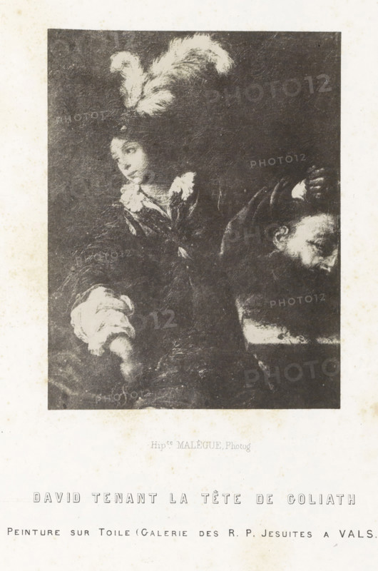 Photo reproduction of a painting depicting David with the head of Goliath, David tenant la tête de Goliath, photograph, reproduction, page, inscription: 'peinture sur toile (Galerie des RP Jesuites a Vals.)', number: 'PL. 31.', photographer: Hippolyte Malègue, France, after painting by anonymous, c. 1850 - in or before 1857, paper, salted paper print, height 133 mm x width 102 mm, David with Goliath's head, A monochrome reproduction of a painted scene framed by a white border, showing a figure wearing a high feathered headdress and ornate clothing, the face turned slightly and looking outward, with textured brushwork around the head and shoulders; a second partially visible face appears lower and to the right, tilted downward; a detached head with a turban-like wrapping is shown at the lower left of the dark interior area; the surrounding border contains printed lines of small text below the image.