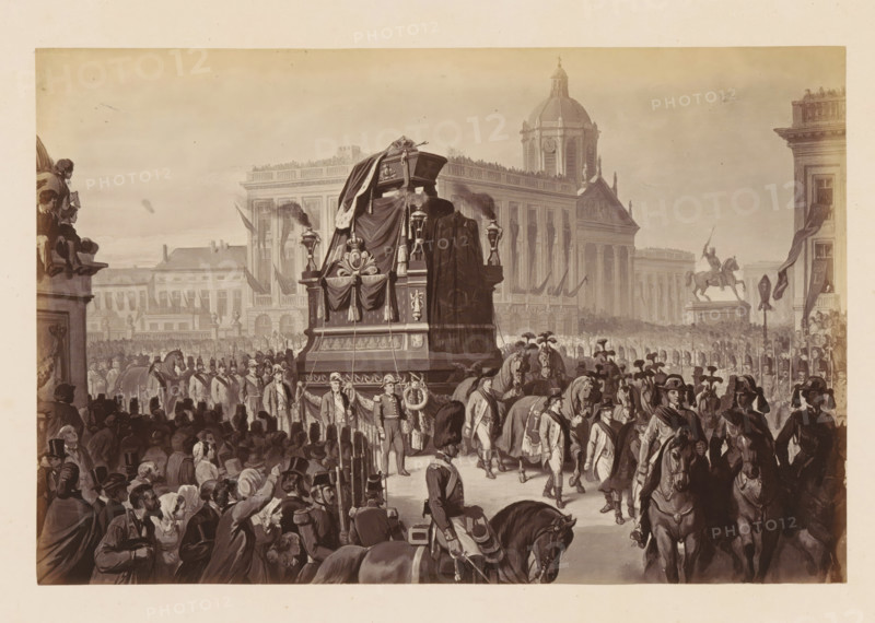 Cortège Funèbre de SM Léopold 1er - Place des Palais à l'angle de la rue Royale, Photo reproduction of a design of the funeral procession of King Léopold I of Belgium in Brussels, photograph, reproduction, This photo is part of a cover with fourteen photos., photographer: Ghémar Frères, Brussels, after design by anonymous, c. 1861 - in or before 1866, Ghémar Frères, photographer, after design by, paper, albumen print, height 166 mm x width 250 mm, Person, Leopold I (king of the Belgians), cortege, funeral procession, king, Period, 1865-12, A large procession moves through a city square dominated by a draped funeral carriage adorned with ornate decorations and tassels, pulled by horses and escorted by uniformed soldiers. A dense crowd of onlookers fills the foreground and sides, many wearing hats and coats, some gesturing or pointing. Mounted riders in military attire ride alongside foot soldiers who carry rifles and banners. In the background, grand classical buildings with columns and...