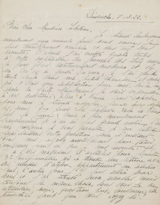 Letter to Philip Zilcken, letter, writer (clerical worker): Rose Imel, 1922-03-05, writer (clerical worker), paper, materials by function, lined paper, ink, writing (processes), pen, height 425 mm x width 425 mm, Person, Philip Zilcken, workshop, studio of the artist (in general), painting (including book-illumination, miniature-painting), exhibition, art, Paris, Venice, A sheet of aged paper with pale horizontal ruling fills the image, covered across its surface with cursive handwriting in a dark ink that varies in intensity, showing flowing slanted lines and looping strokes; the ink appears slightly faded in places and there are small brownish spots and faint creases on the paper, including a vertical crease near the center and subtle horizontal fold marks, while the margins show slight discoloration and the overall tone of the paper is an off-white with a warm, slightly yellowed patina.