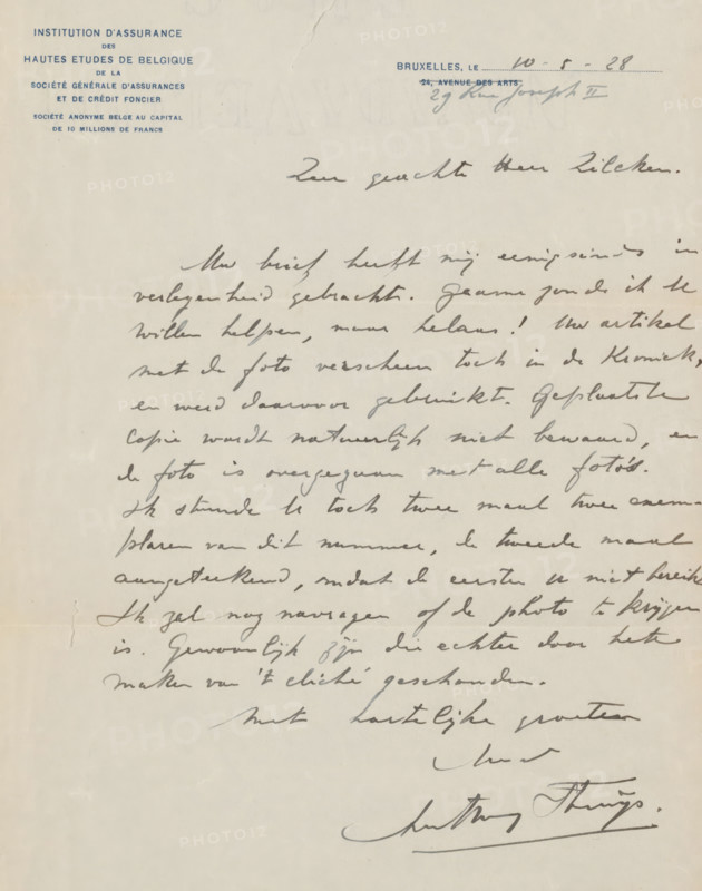 Letter to Philip Zilcken, letter, writer (clerical worker): Anthony Struys, Brussels, 1928-05-28, writer (clerical worker), materials by function, paper, ink, writing (processes), pen, printing, height 425 mm x width 425 mm, Person, Philip Zilcken, photography, cinematography, printed matter, A sheet of aged off-white paper with blue printed headings in the upper left and right corners and a light vertical crease near the top, covered across most of its surface by dark cursive handwriting in ink, with heavier inked signatures near the lower right; the paper shows slight discoloration and faint horizontal fold lines, small tears and worn edges, and areas of lighter blank space toward the left and bottom margins.