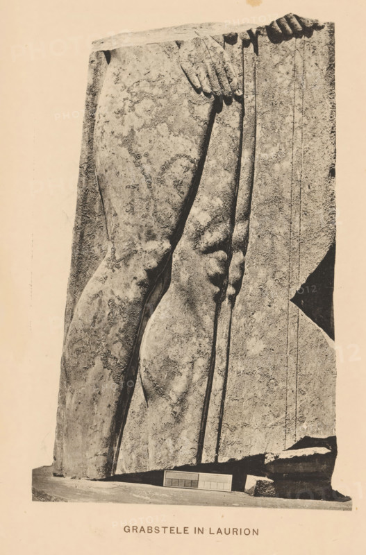 Grab stele from Laurion, Grabstele in Laurion, page, photomechanical print, inscription: 'Athen Mittheilungen 1887 Tafel X', photographer: Bruckmann, Munich, c. 1881 - in or before 1886, printer (person), Bavaria, paper, collotype, photoprint, height 181 mm x width 117 mm, Print four pages after page 276., upright gravestone, stone, building material, A close-up view of a weathered stone relief showing two human legs and hands carved in a vertical slab, with textured surfaces and visible erosion marks; the left side shows the back of a leg and buttock, the right side shows a front-facing thigh and knee, and two hands appear near the top gripping the edge of the slab; the stone rests on a flat base with scattered broken fragments beside it and a small rectangular panel on the base; the background is plain.