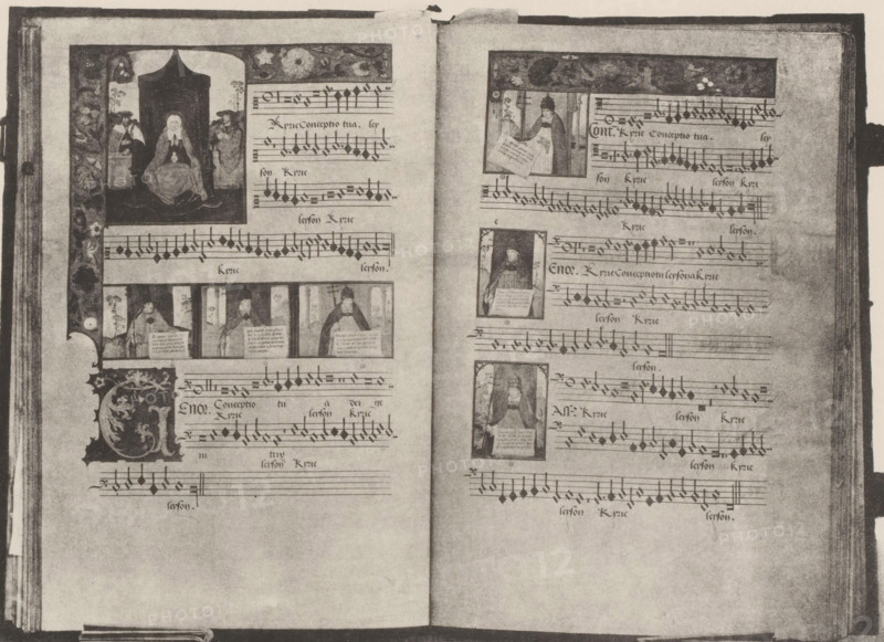 Manuscript on parchment, displayed at an exhibition on religious objects from the Middle Ages and Renaissance in 1864 in Mechelen, page, photomechanical print, number: '16', number: '-48', number: '16 GG', photographer: Joseph Maes, Mechelen, clichémaker: Simonau & Toovey, Antwerp, 1864 - in or before 1866, paper, photolithography, height 198 mm x width 266 mm, manuscript of musical score, parchment, vellum (writing material), Period, 1864, A grayscale photograph of an open book showing two facing pages with printed musical staff lines and square-shaped musical notes, decorated rectangular illustrations inset among the staves, and ornate vertical borders featuring floral and figurative ornamentation; the left page contains a large framed scene at the lower left and a narrow decorative band along the inner margin, while the right page shows multiple small framed portraits or scenes aligned horizontally across the center; the pages have a worn, textured appearance with darker edges and a...