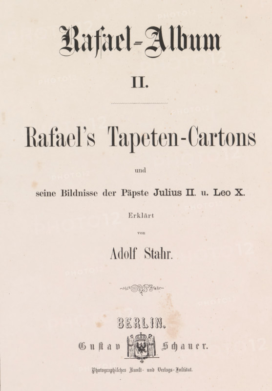 Rafael-Album II, book, writer (clerical worker): Adolf Stahr, printer (person): G. Bernstein, Berlin, publisher: Gustav Schauer, 1861, writer (clerical worker), printer (person), textile materials, pasteboard, paper, linen (material), albumen print, height 335 mm x width 260 mm x thickness 15 mm, A faded cream page with dark printed decorative elements and large ornamental lettering near the top, a horizontal dotted line beneath, several lines of centered printed text in different serif and blackletter styles down the page, a small ornamental flourish in the middle, a faint circular stain toward the lower center, and an intricate emblem with decorative figures and filigree near the bottom.