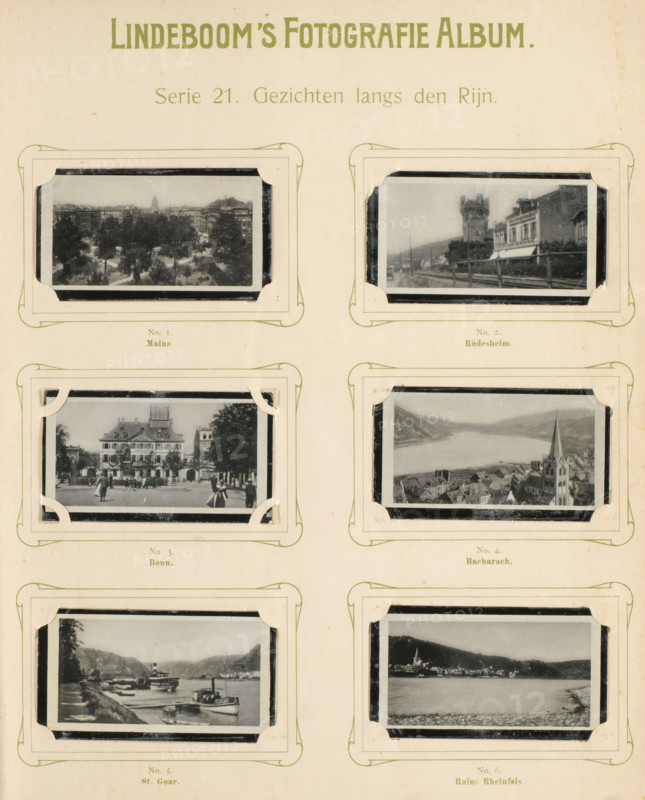 Six reproductions of photographed cityscapes from Mainz, Rüdesheim, Bonn, Bacharach, Sankt Goar and Rheinfels Castle, Views along the Rhine, album page, reproduction, photomechanical print, These prints are part of an album., inscription: 'Series 21.', after photo by anonymous, publisher: BJ Lindeboom & Zonen, Amsterdam, 1905 - 1906, pasteboard, paper, collotype, photogravure, height 300 mm x width 238 mm, Such prints were known as 'black ones'. They were obtained for collecting when purchasing certain brands of tea, cocoa, cigarettes, biscuits, etc. There were collector albums in circulation specially produced for the 'little blacks'., city-view in general, 'veduta', North Rhine-Westphalia, Rhineland-Palatinate, Sankt Goar, Mainz, Rheinfels Castle, A cream-colored album page with decorative green borders showing six black-and-white photographs mounted in corner holders, arranged in three rows and two columns, each photograph framed by a rectangular mat with rounded decorative corners;...