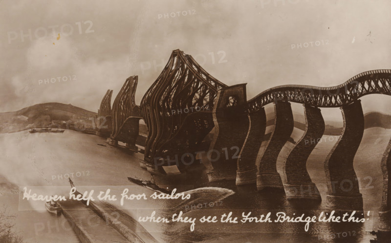 Heaven help the poor sailors when they see the Forth Bridge like this!, Davidson's Real Photographic Series, photograph, picture postcard, Scotland, publisher: Davidson Brothers, London, 1905 - 1911, Davidson Brothers, photographer, publisher, paper, baryta paper, daylight gelatin silver print, height 85 mm x width 134mm, cantilever bridge, Forth Bridge, A sepia-toned photograph shows a large arched metal bridge with ornate latticework spanning a body of water, the bridge supports appearing distorted and wavy. Several tall, curved steel trusses rise from the piers, their repeating vertical and diagonal members visible. The stone piers stand in the water and cast reflections. Small boats are moored along a riverbank beneath the bridge and a shoreline with low hills appears in the background. The sky is cloudy and the image has scratches and age marks across its surface.