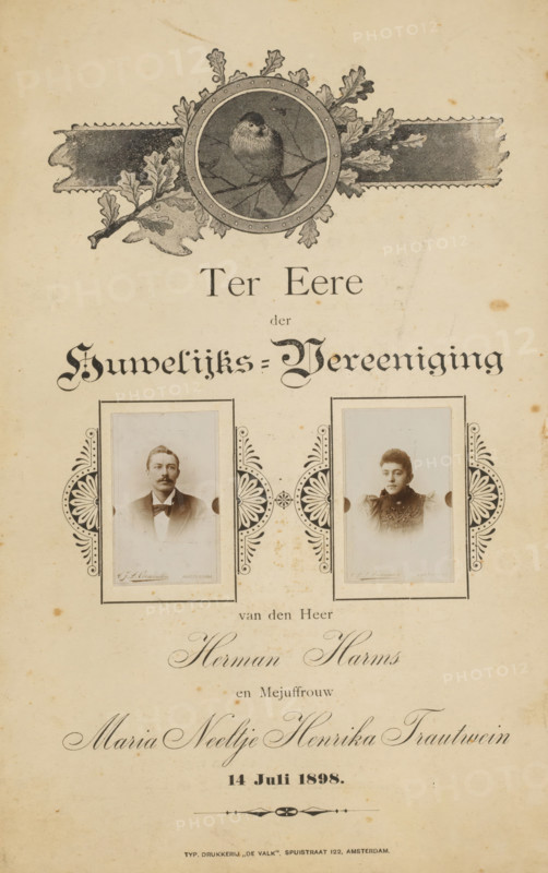 Lyrics with miniature portraits of the couple Herman Harms and Maria Neeltje Henrika Frautwein, on the occasion of their wedding, photograph, Inside the card a wedding song on behalf of the parents of the bride and groom., inscription: 'In Honor of the Marriage Union of Mr. Herman Harms and Miss Maria Neeltje Henrika Frautwein, July 14, 1898., TYP. PRINTING PRESS 'DE VALK'. SPUISTRAAT 122, AMSTERDAM.', photographer: Cornelis Johannes Lodewicus Vermeulen, Amsterdam, printer (person): De Valk, 1898-07-14, printer (person), paper, baryta paper, daylight collodion silver print, height 220 mm x width 138 mm, height 41 mm x width 25 mm, Person, Herman Harms, Maria Neeltje Henrika Frautwein, adult woman, adult man, A vertically oriented aged paper sheet with decorative printed artwork, featuring a circular illustrated medallion at the top containing a small bird perched on a branch surrounded by ornamental leaves and horizontal ribbon-like elements. Below the medallion are two framed portrait...