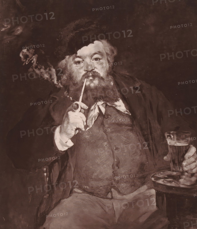 Reproduction of Le Bon Bock by Édouard Manet, Le Bon Bock, reproduction, page, photomechanical print, inscription: 'Galerie Contemporaine, Littéraire, Artistique, 126, boulevard de Magenta, Paris', photographer: Anatole Louis Godet, cliché maker: Goupil & Cie., after design by Edouard Manet, c. 1871 - in or before 1876, paper, Woodburytype, Woodburytypepie, height 176 mm x width 152 mm, adult man, pipe, tobacco, painting, drawing and the graphic arts, A seated bearded man wearing a dark coat and a hat holds a long smoking pipe to his mouth with one hand while a plume of smoke rises beside his head, and his other hand holds a tall glass resting on a small round table; his clothing includes a vest and a loosely tied neckerchief, and the scene is rendered in a muted, monochrome palette.