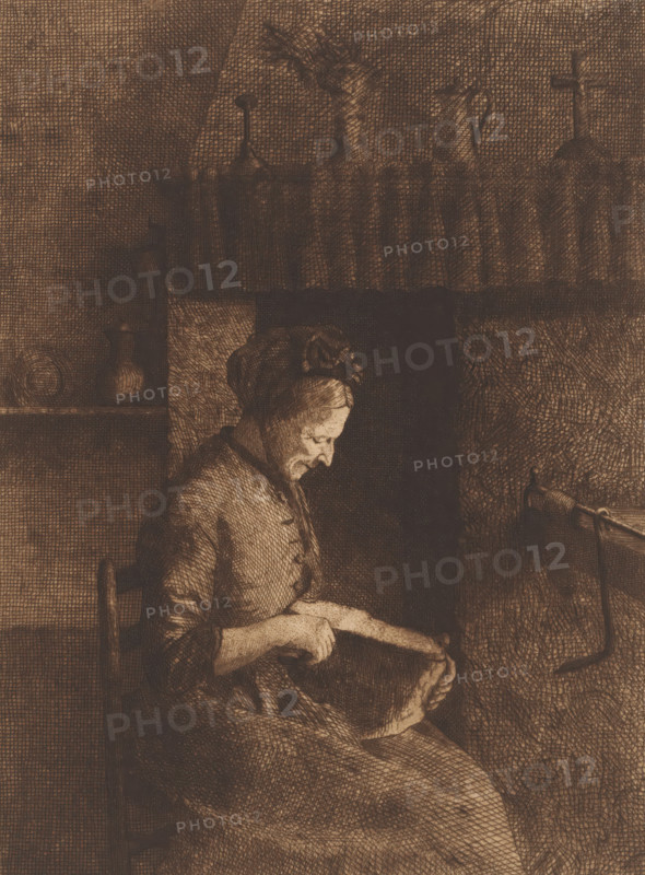 Old woman cutting a slice of bread, print, annotation: 'Imp. Van Campenhout', printmaker: Herman Boulenger (signed by artist), printer (person): JB van Campenhout, 1892, printer (person), paper, etching, drypoint, intaglio printmaking technique, height 309 mm x width 227 mm, Date of death of artist unknown. Therefore, the acquisition date has been used to determine the rights to this object., old woman, slicing bread, A seated woman wearing a bonnet and simple dress looks downward at a piece of cloth she holds in her hands, her profile and hands illuminated against a darker background; behind her is a high-backed chair, a shelf with small rounded vessels, a raised mantle with decorative finials, and a vertical cross on a distant ledge, while the surrounding walls and furnishings are rendered in dense crosshatched shading.