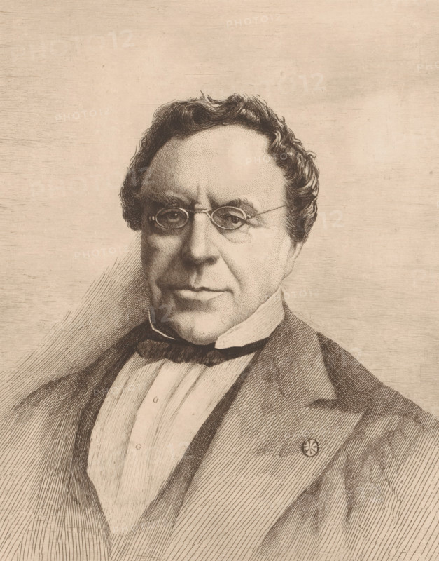 Portrait of Emile Masquelier, alderman of Mons, print, annotation: '1er état', printmaker: Auguste Danse (signed by artist), 1889, paper, etching, intaglio printmaking technique, height 267 mm x width 211 mm, Person, Emile Albert André Martin Joseph Masquelier, historical person, - historical person, portrayed alone, A detailed sepia-toned engraved portrait of a man shown from the chest upward, featuring wavy dark hair, round eyeglasses, and a high-collared shirt with a bow tie beneath a suit jacket; fine engraving lines create shading and texture on the face, hair, and clothing, and a small circular pin is visible on the jacket lapel.