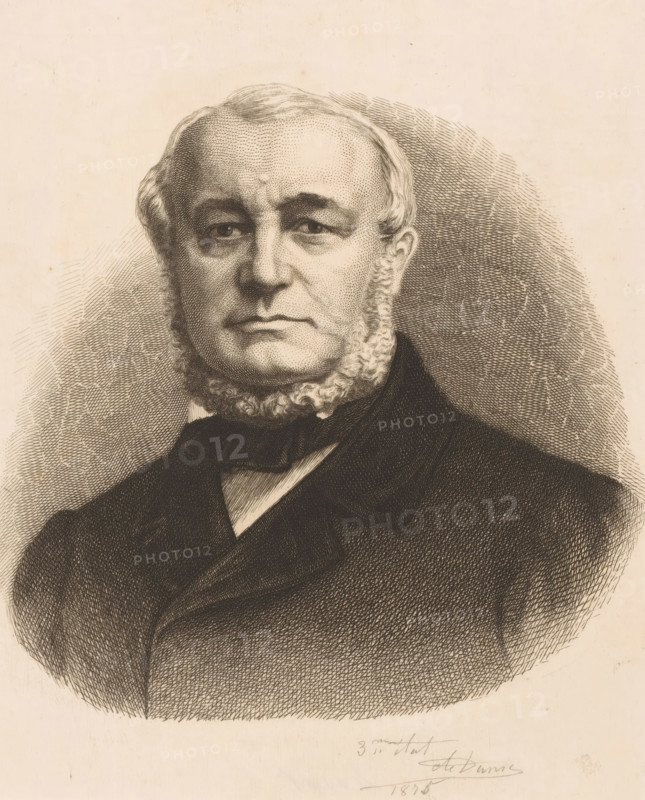 Portrait of an unknown man named Raymaekers, print, annotation: '3ème état', annotation: 'Raymaekers', printmaker: Auguste Danse, 1883, paper, etching, intaglio printmaking technique, height 159 mm x width 119 mm, anonymous historical person portrayed alone, A monochrome engraved portrait of an older man shown from the chest up, facing forward with a neutral expression; he has a rounded forehead, receding hairline, and neatly curled sideburns framing his lower cheeks and jaw. The man's eyes are slightly drooped and shaded, his eyebrows are full, and his mouth is closed with a subtle downturn at the corners. He wears a dark coat with wide lapels and a high collar, with a bow or cravat at his neck. The background consists of dense crosshatching that radiates outward from the figure, and the paper shows a warm, aged tone.