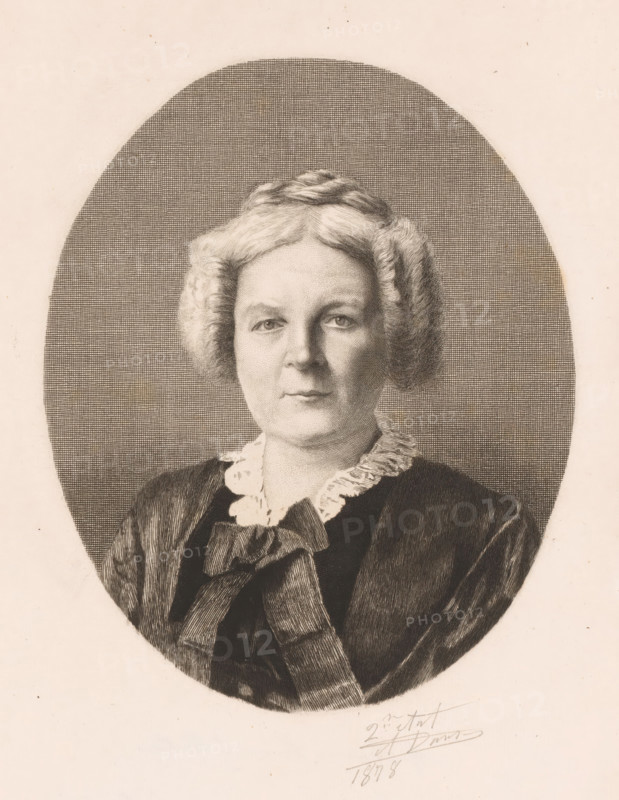 Portrait of an unknown lady, Madame Sainctelette, print, annotation: 'Mme Sainctelette', annotation: 'Tirer a 2 exemplaires AD', annotation: '2me état', printmaker: Auguste Danse (signed by artist), 1878, paper, etching, drypoint, height 327 mm x width 227 mm, anonymous historical person depicted alone - BB - woman, A monochrome engraved portrait of a middle-aged woman shown from the chest up within an oval frame, with short wavy hair styled close to the head, a calm neutral facial expression, eyes looking forward, and dressed in a dark garment with a ruffled light collar and a large bow at the throat, the background inside the oval filled with fine crosshatching and the surrounding page left blank.