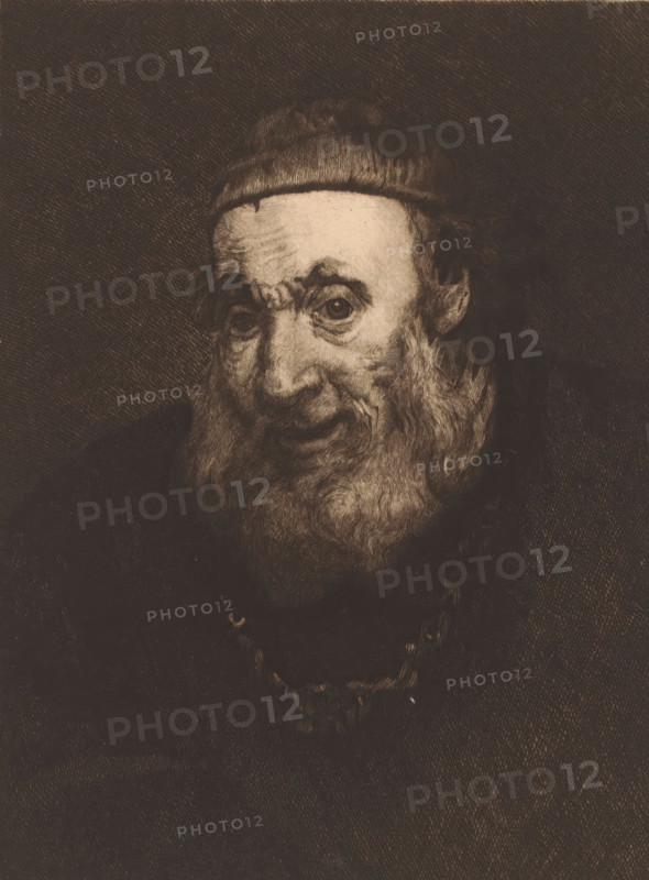 Head of an old man, print, printmaker: Charles Théodore Bernier (signed by artist), after painting by Rembrandt van Rijn, 1887, paper, etching, drypoint, intaglio printmaking technique, plate tone and drypoint, height 291 mm x width 212 mm, old man, An older man with a rounded cap and a full, textured beard fills the frame, his face rendered in fine, crosshatched lines that emphasize wrinkles around his eyes and forehead; his gaze is directed slightly to the side, and his mouth is partially open, revealing the suggestion of teeth, while dark clothing and a necklace with rounded beads are visible against a heavily shaded background.