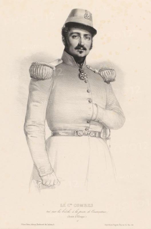 Portrait of Colonel Michel Combes, Le C.el Combes, print, Series number, 17, printer (person): Auguste Bry, Paris, publisher: Gihaut frères, 1830 - 1871, printmaker, printer (person), paper, chine collé, lithography, height 476 mm x width 317 mm, Person, Michel Combes, historical persons, A black and white drawing of a man in a military uniform shown from the waist up, wearing a brimmed cap with a decorative emblem, a high-collared coat with braided shoulder epaulettes, a star-shaped medal at his throat, a belt with a decorative buckle, one hand tucked inside his coat and the other hand holding a folded glove or cloth at his side, with facial hair including a mustache and sideburns and a neutral expression, rendered on aged paper with small spots and light shading around the figure.
