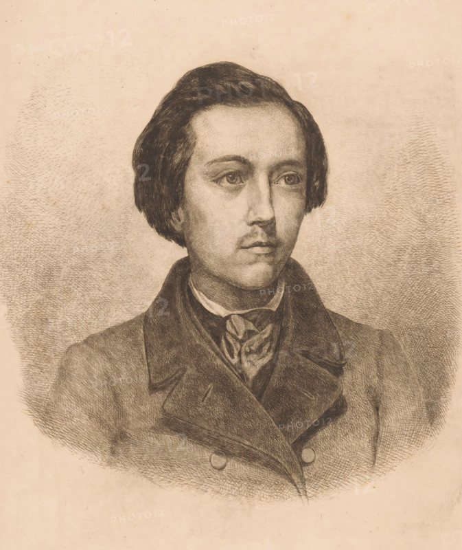 Portrait of an unknown young man, print, printmaker: attributed to Kamphoven, 1850 - 1899, Attributed to, paper, etching, intaglio printmaking technique, etching with plate tone, height 310 mm x width 247 mm, According to the inscription, it is possibly a portrait of Humkuiverberg., historical persons, youth, adolescent, A sepia-toned pencil or charcoal portrait of a young man shown from the chest up, with short dark hair parted and combed to the sides, neatly shaped eyebrows, and a contemplative facial expression; he wears a high-collared shirt with a tied neckerchief and a double-breasted coat with wide lapels, rendered with fine crosshatching and textured shading against a softly textured background.